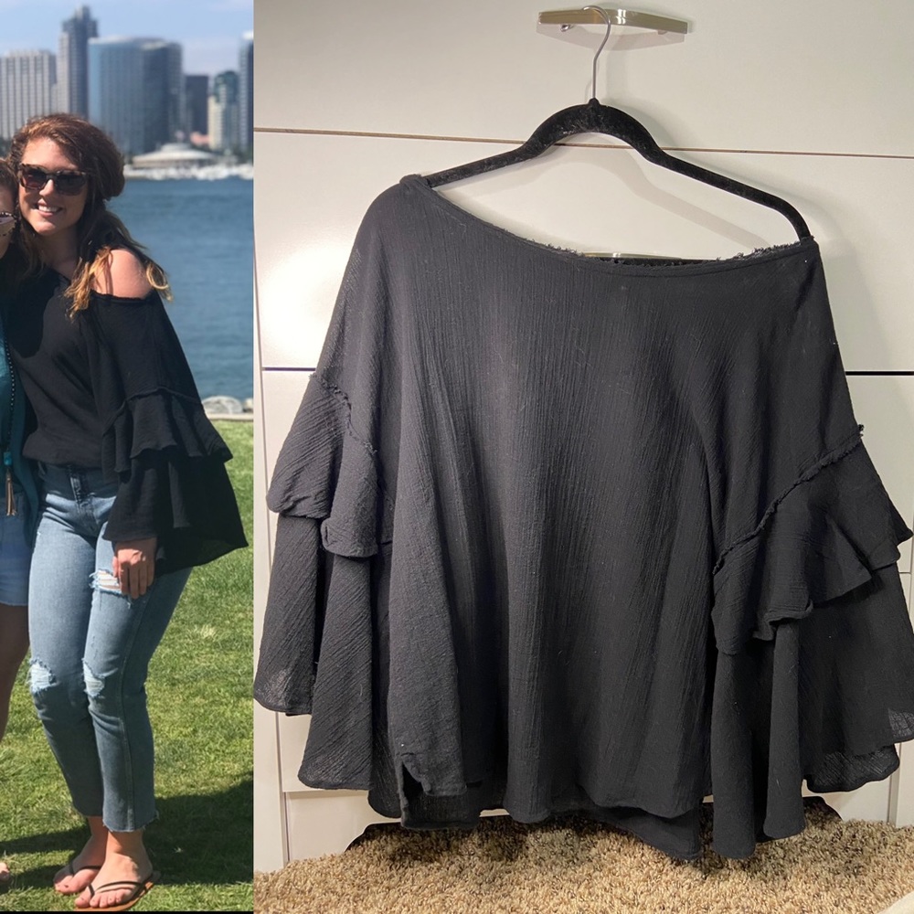 SOLD Free People black bell sleeve top